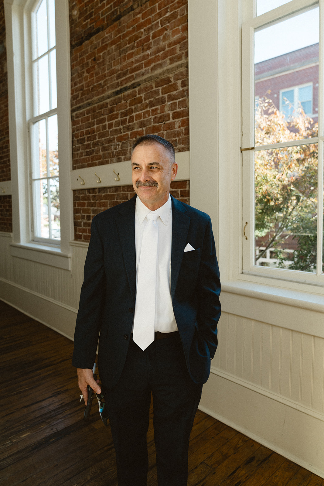 Father has a first look with her daughter for a wedding at Stanly Hall Ballroom