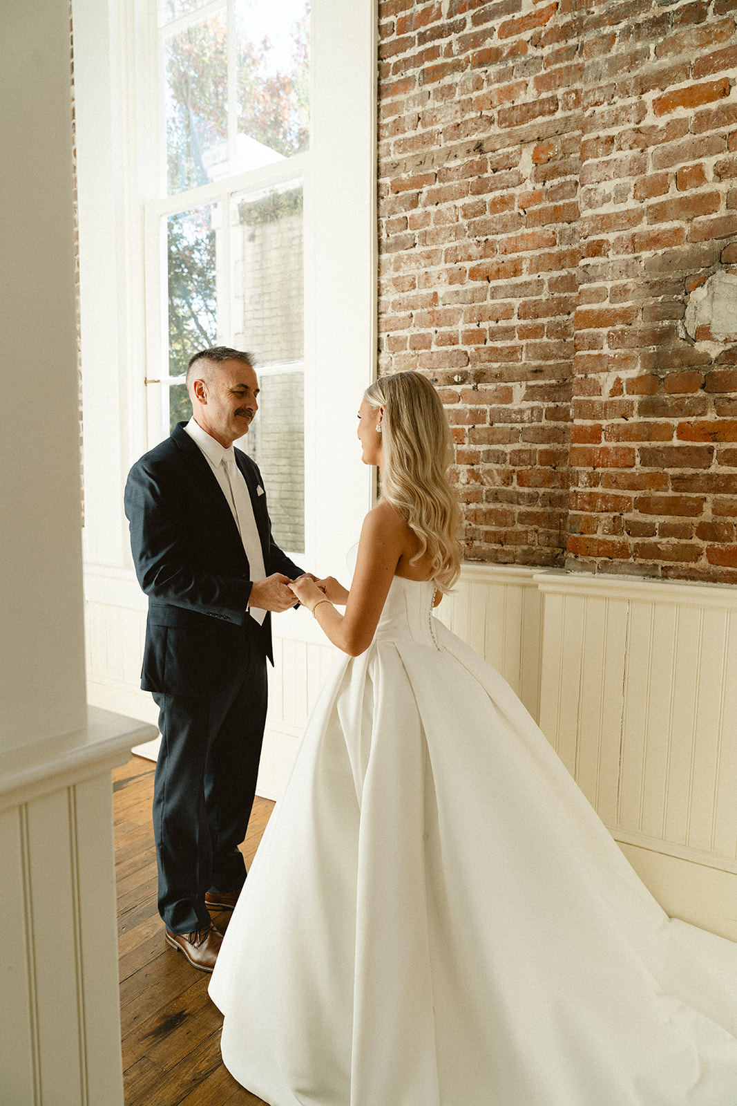 Father has a first look with her daughter for a wedding at Stanly Hall Ballroom