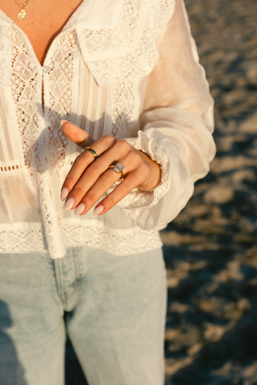Couple takes beach engagement photos on the East Coast. Taken by a North Carolina engagement photographer